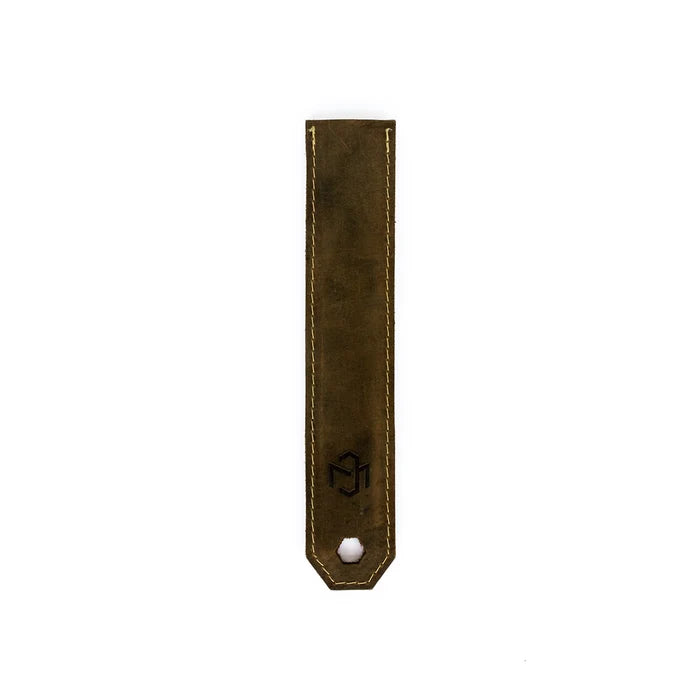 Brown leather handle cover for a carbon steel pan