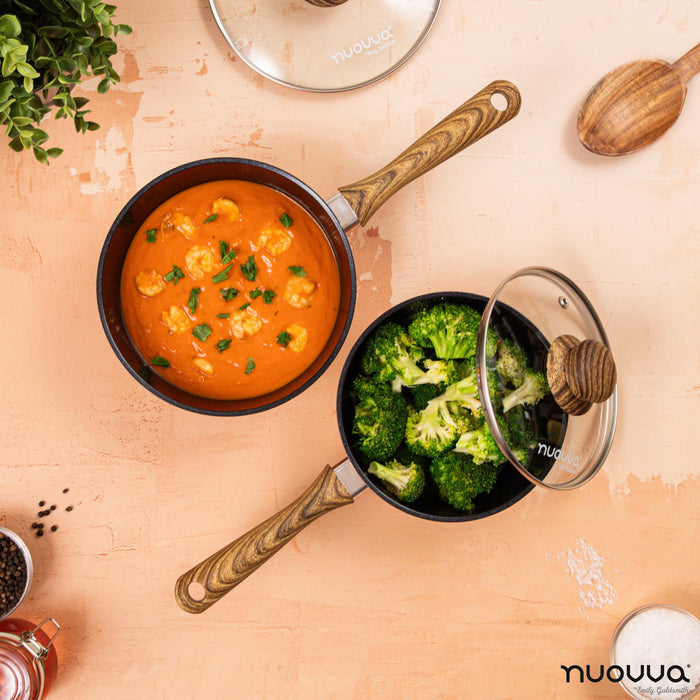 Copper set of saucepans with glass lids and wooden handles for cooking, sautéing, boiling and more - with Nuovva induction cookware.