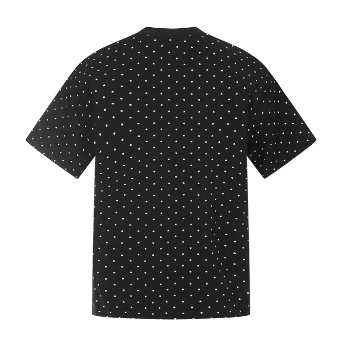 Black relaxed streetwear tee with allover white micro heart print and short sleeves, shown from the back