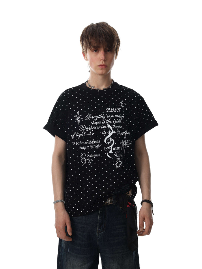 Black relaxed fit graphic tee with allover micro-heart print and white script artwork on the front