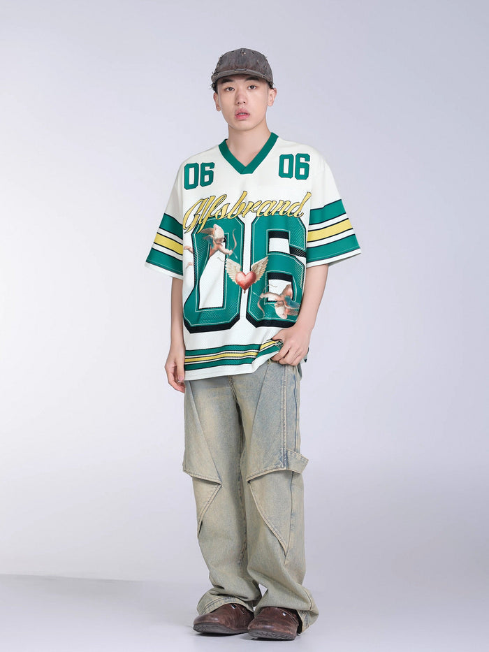 Oversized white varsity football jersey with teal stripes, angel graphics, and bold number 06 on a model