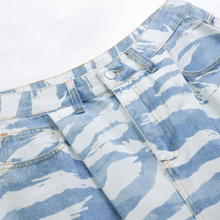 Close-up of waistband and front fly on light blue zebra camo denim
