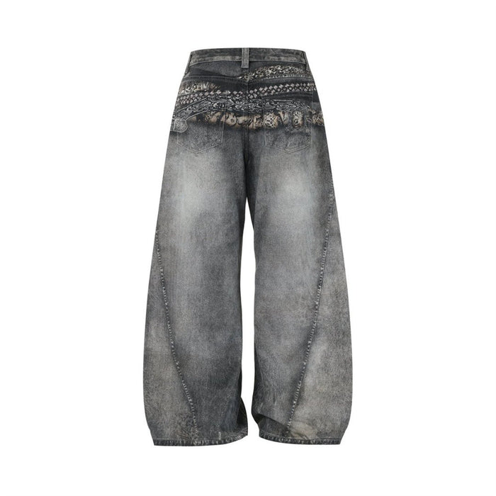 Back flat lay of acid-washed grey wide-leg jeans with patterned waistband and rear pockets