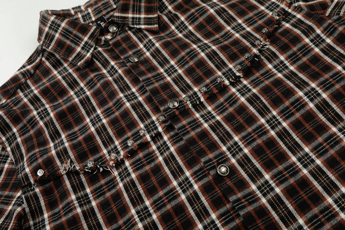 Distressed brown plaid short sleeve shirt with raw edge details and metal snap buttons