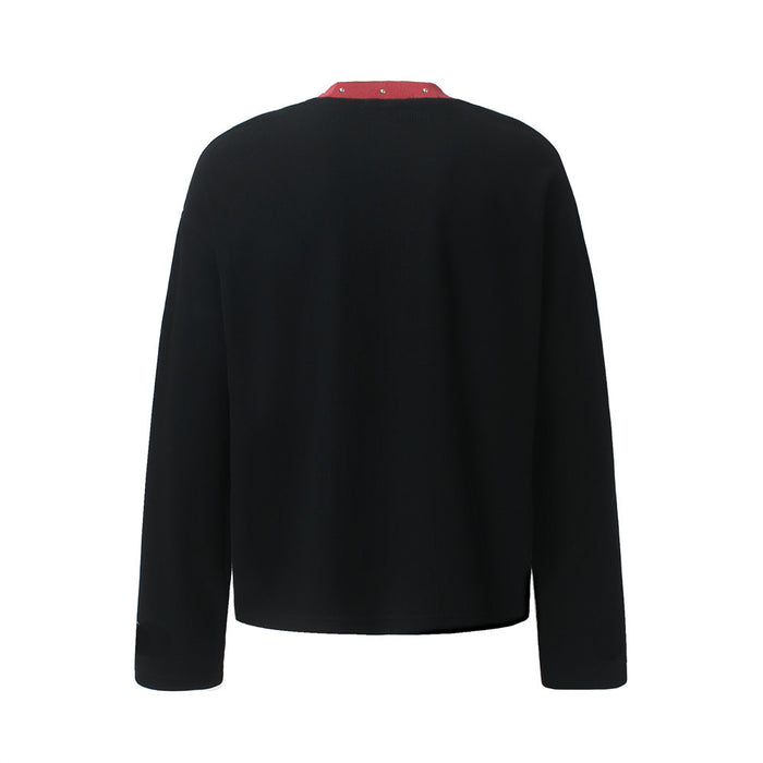 Back view of a black long sleeve tee with a red studded collar visible at the neckline