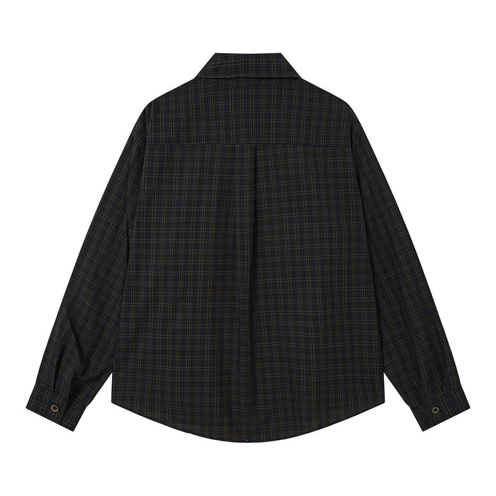 Black and dark blue plaid shirt shown from the back with a center pleat and curved hem