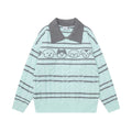 Front view of the mint cable-knit polo sweater with gray stripes, dark collar, and cartoon dog band