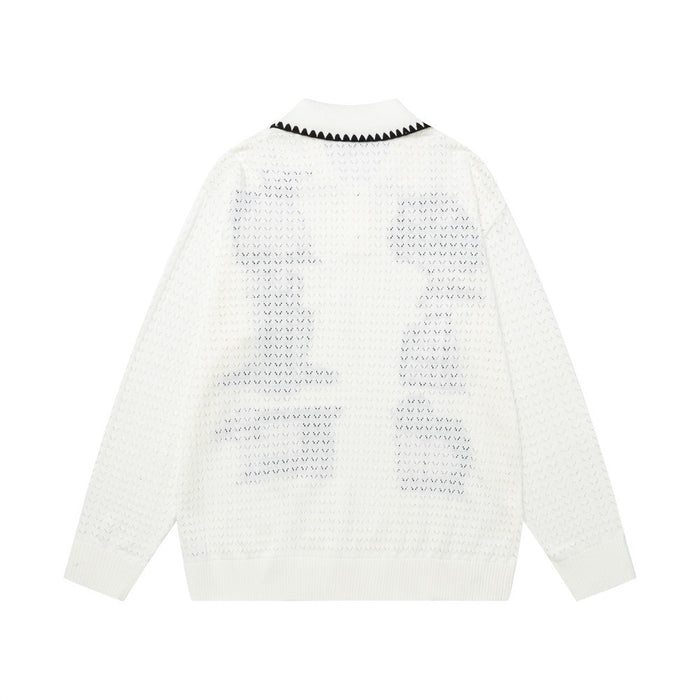 Back view of the cream jacquard knit pullover sweater showing the textured knit and long sleeves