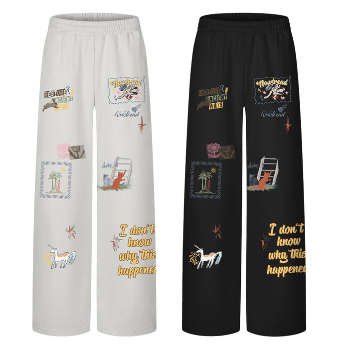 Front view of white and black wide-leg sweatpants with colorful cartoon-style graphics and text prints