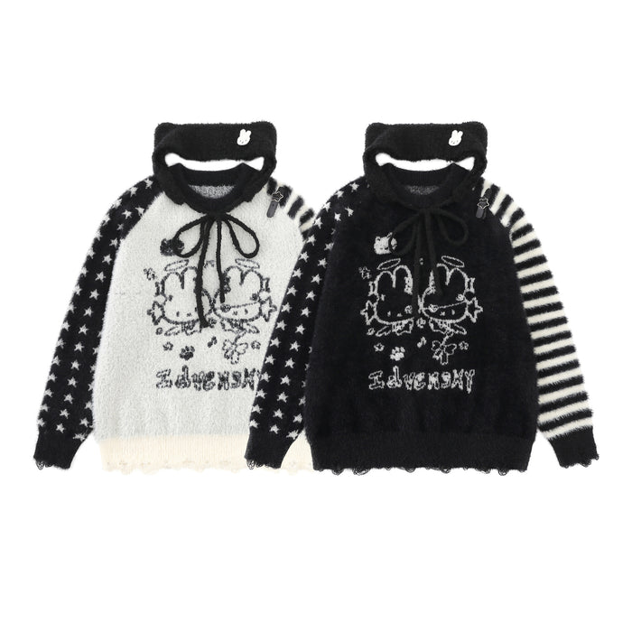 Two fuzzy knit sweaters shown front-facing in white and black, with bunny graphics and star-and-stripe sleeves