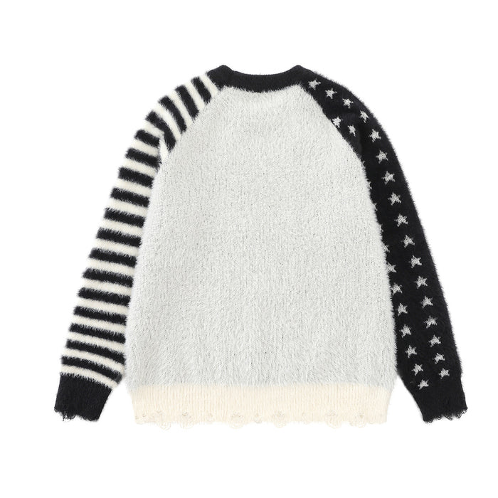 Back view of the white fuzzy sweater with black star and striped raglan sleeves and a scalloped hem