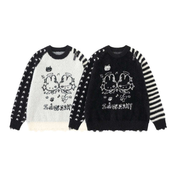 White and black fuzzy knit sweaters shown front-facing with twin bunny graphics and mixed star-and-stripe sleeves