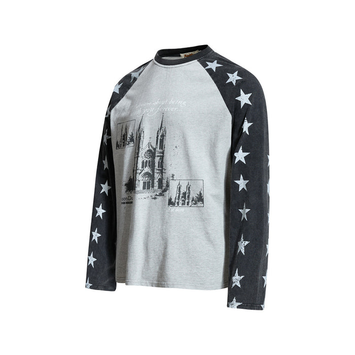 Gray raglan long sleeve tee with black star-print sleeves and cathedral graphic front