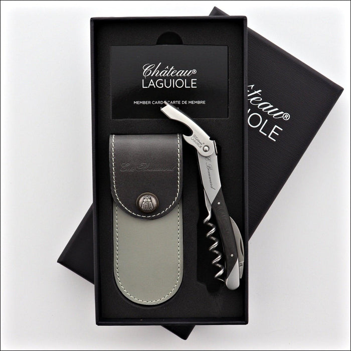 Chateau Laguiole Eric Beaumard Corkscrew, top-down view of the black handle, worm, and foil cutter. Handcrafted details, 100% Made in France.
