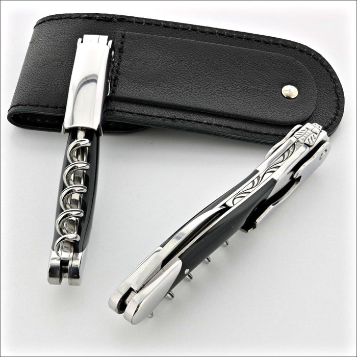 Chateau Laguiole Grand Cru Dark Horn Tip Corkscrew, close-up of two corkscrews with black leather case. Handcrafted details, 100% Made in France.