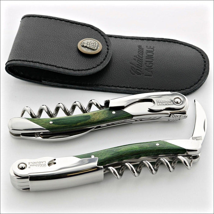 Chateau Laguiole Grand Cru Green Stamina Corkscrew, top-down view of two corkscrews with green stamina handles and a black leather case. Handcrafted details, 100% Made in France.