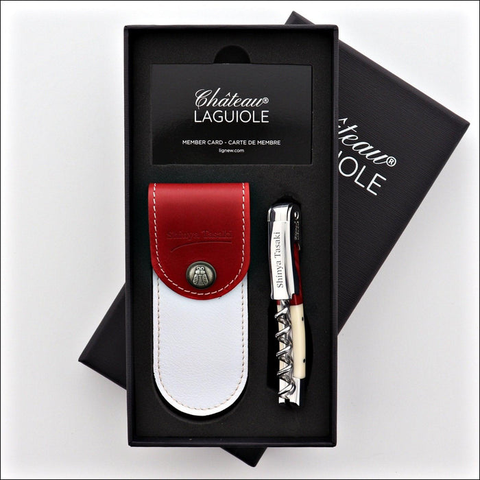 Chateau Laguiole Shinya Tasaki corkscrew, red and white handle, with leather pouch. Handcrafted details, 100% Made in France.