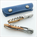 Chateau Laguiole Versailles Series corkscrew, juniper wood handle detail, blue leather case. Handcrafted details, 100% Made in France.