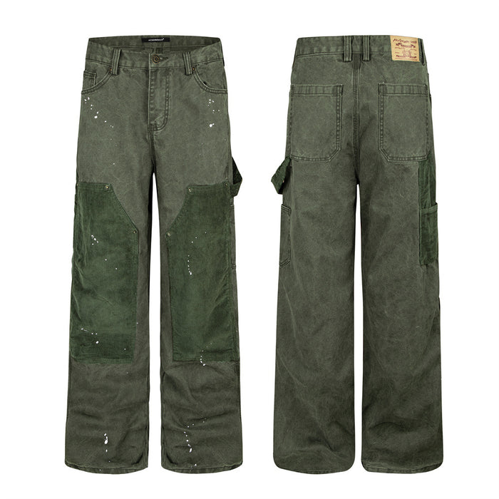 Olive green carpenter pants shown front and back with darker corduroy knee patches, utility pockets, and white paint splatters
