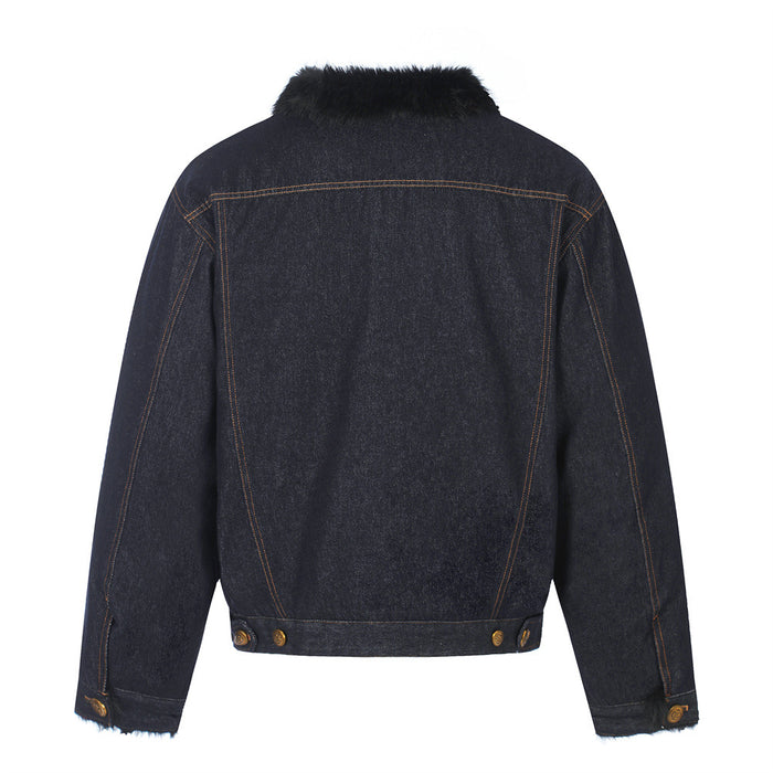 Dark indigo denim jacket back view with black faux fur collar, orange stitching, and buttoned cuffs