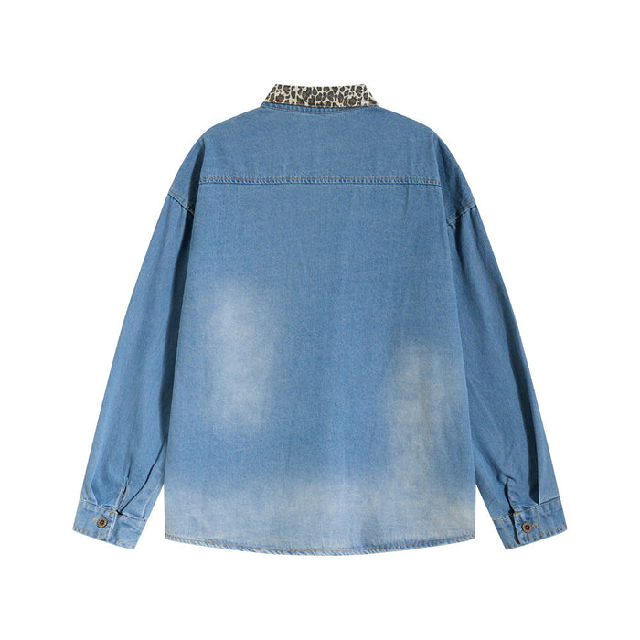 Back view of a light blue denim shirt with long sleeves and a leopard-print collar