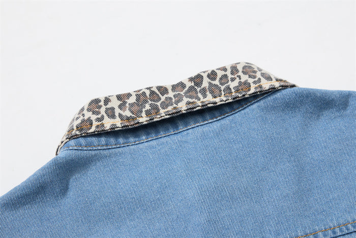 Close-up of the denim shirt's leopard-print collar with visible edge stitching