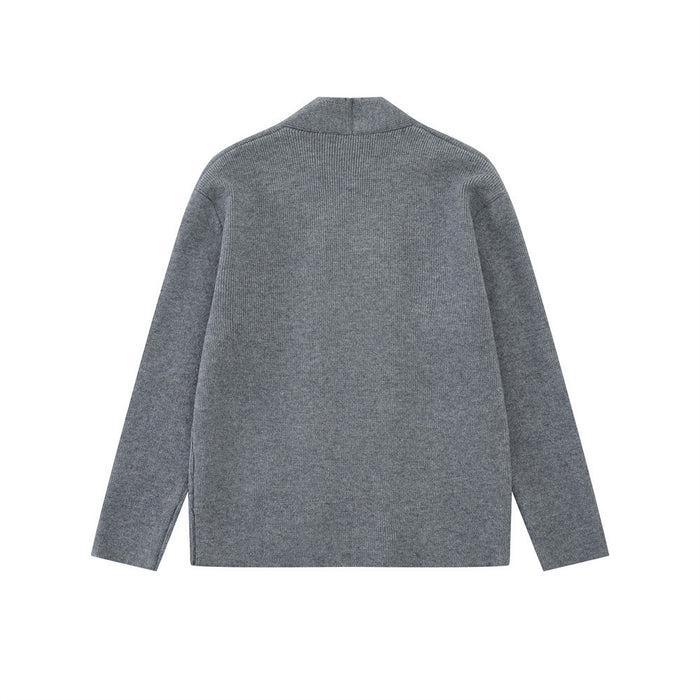 Back view of a gray knit cardigan showing its plain textured back, collar, and long sleeves