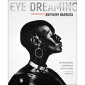 This image features the cover of "Eye Dreaming: Photographs by Anthony Barboza," a monograph that explores the career of the celebrated photographer Anthony Barboza. The cover showcases a striking black and white photograph of a woman in profile, accentuated with large, circular earrings and a choker necklace, highlighting Barboza’s ability to capture intense, intimate portraits.