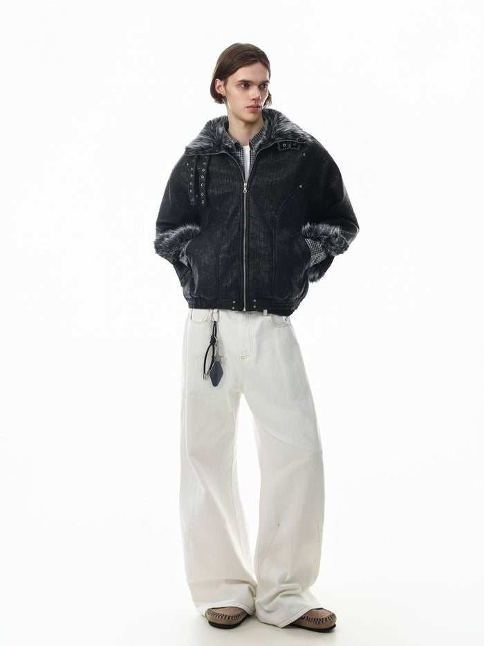 Full-length model view of a black faux fur-trimmed bomber jacket with stand collar