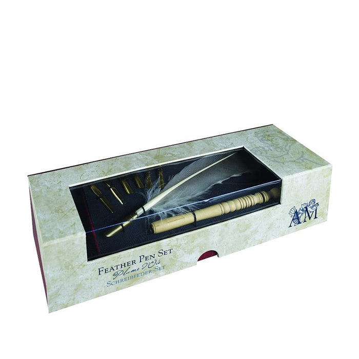 A feather pen set displayed in an open box with a feather quill, wooden stylus, and ink bottle.