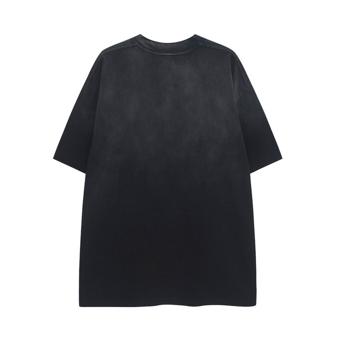 Black oversized washed T-shirt with a faded distressed finish and relaxed streetwear fit, shown from the back