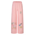 Wide-leg sweatpants in pink with graffiti lettering and colorful daisy floral print on the leg