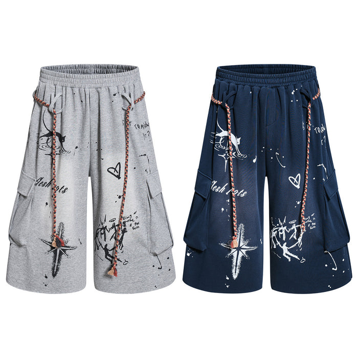 Grey and navy graffiti cargo shorts with rope drawstring, front views side by side