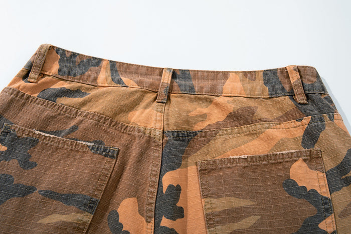 Close-up of back waist on camo cargo pants showing belt loops and rear pockets