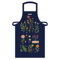 A navy blue apron featuring a vintage botanical illustration with various plants and flowers across the front.