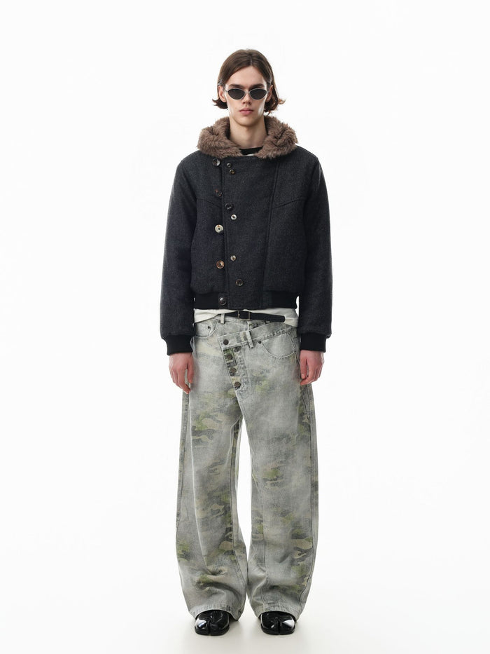 Full-length model view of a black hooded bomber jacket with faux fur trim and ribbed cuffs