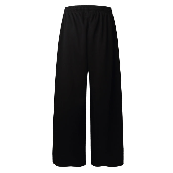 Back view of black wide-leg sweatpants with elastic waistband