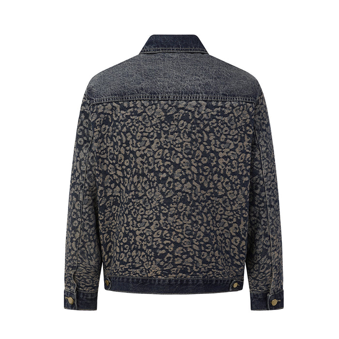 Back view of a dark washed denim jacket with all-over tan leopard print, spread collar, and snap cuffs
