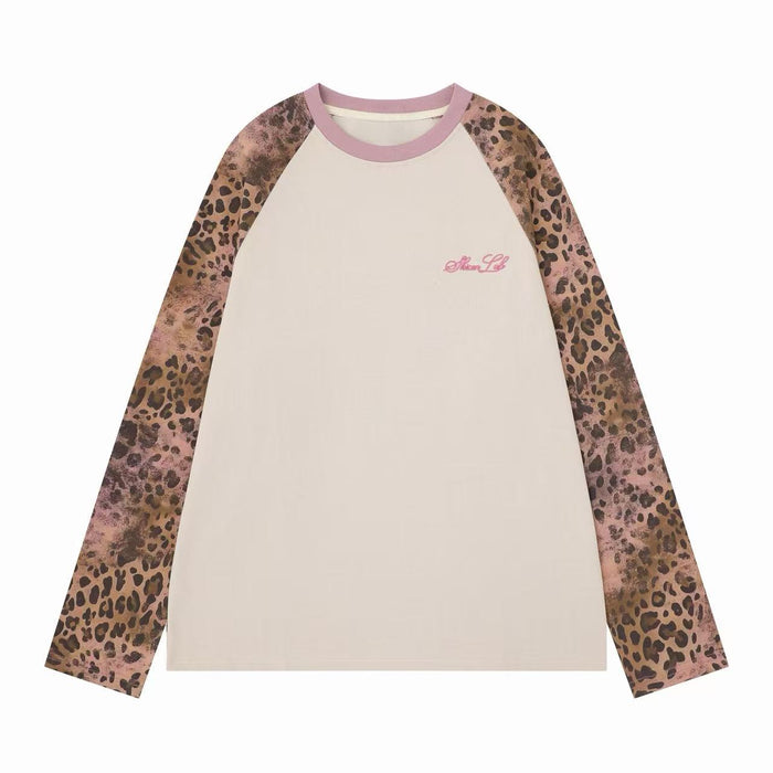 Cream raglan long sleeve tee with pink ribbed collar and leopard print sleeves, front view