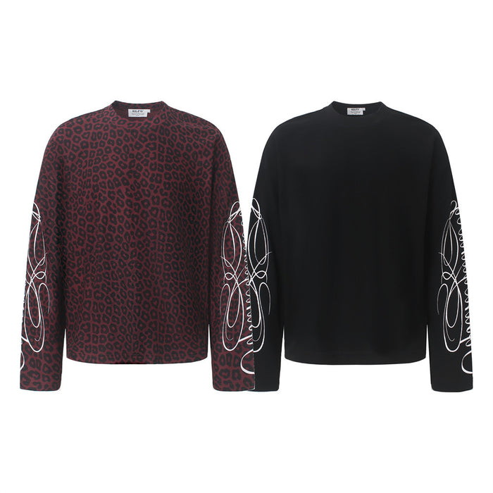 Long-sleeve shirt shown in leopard print front and solid black back views with white sleeve graphics