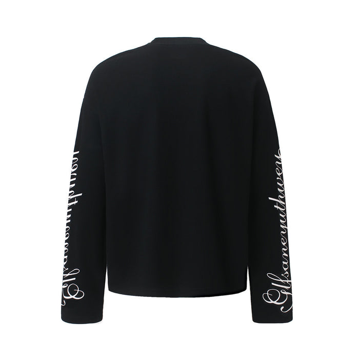 Back view of a solid black long-sleeve shirt with white script and swirl graphics on the sleeves