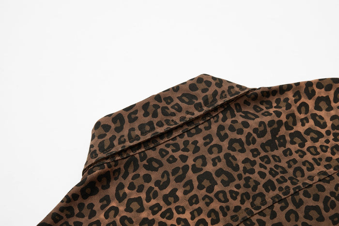 Leopard print statement shirt with brown and black pattern detail on a white background