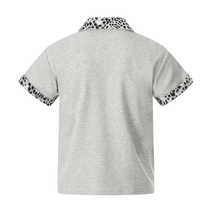 Gray quarter-zip polo shirt with leopard print collar and sleeve trims, shown flat on a white background