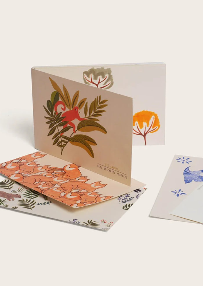 A set of animal print postcards.