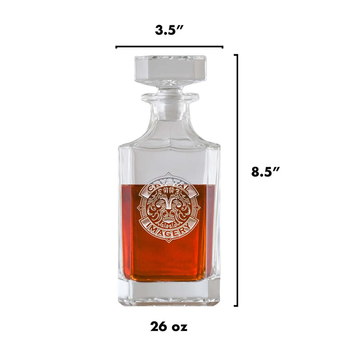Size guide: a square whiskey decanter with a faceted stopper, deep-carved with a sample Crystal Imagery crest; 3.5 inches wide, 8.5 inches tall, 26 ounces.