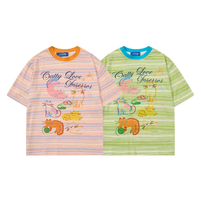 Two striped Catty Love graphic T-shirts with colorful cartoon cats, shown in pastel pink and green with contrasting collars