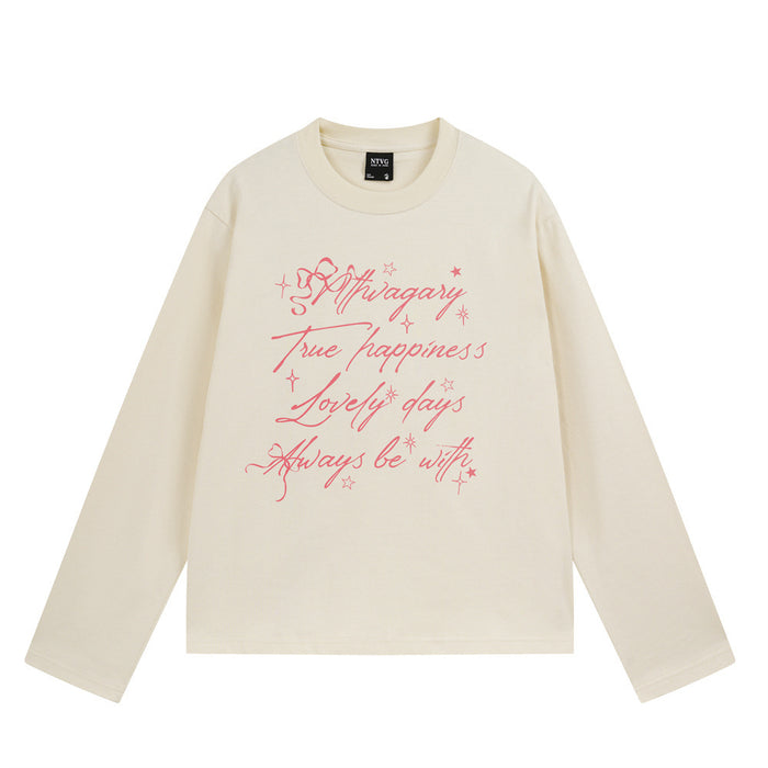 Oversized long-sleeve crewneck tee with hand-drawn cursive script graphic print in black and apricot colorways