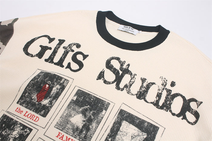 Upper front close-up showing black collar trim, cream waffle-knit fabric, and Glfs Studios lettering