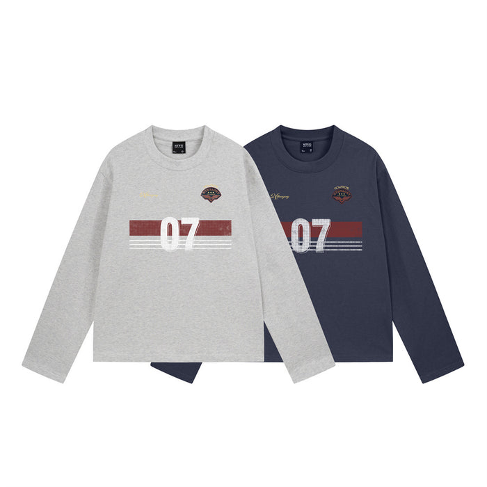 Heather gray and navy long sleeve crewneck tees shown from the front with matching red stripe and white 07 graphics