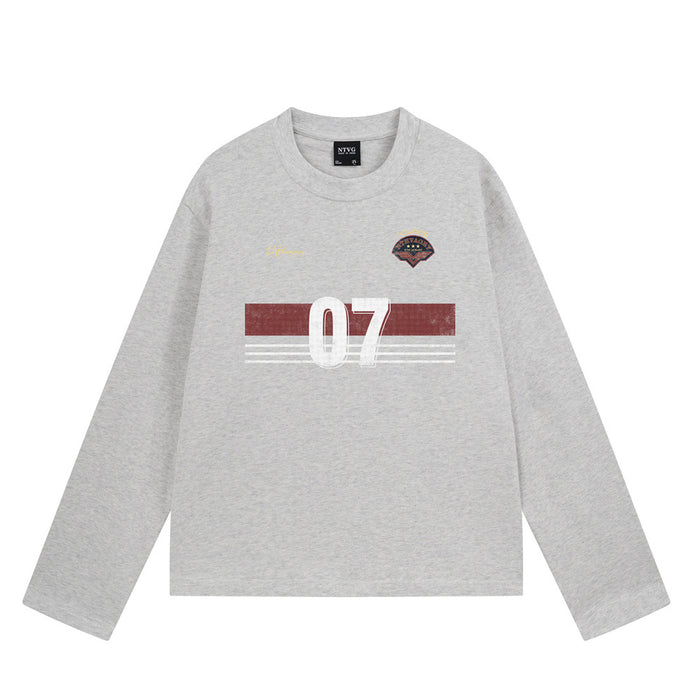 Front view of a heather gray long sleeve crewneck tee with a red stripe, white 07 graphic, crest, and script detail